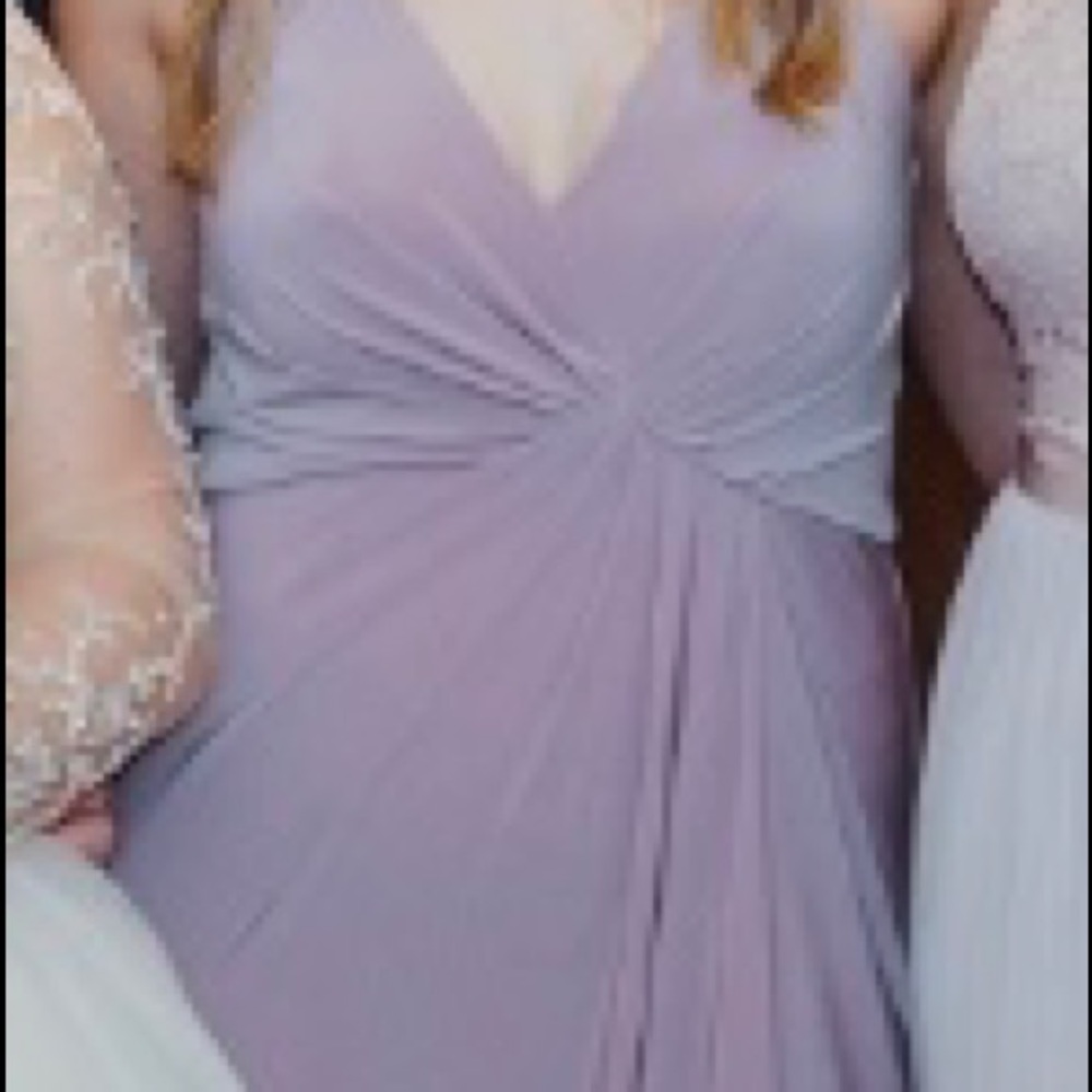 Beautiful blush color long dress with a long slit.